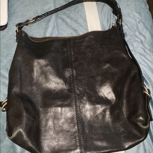 Woman’s black shoulder bag